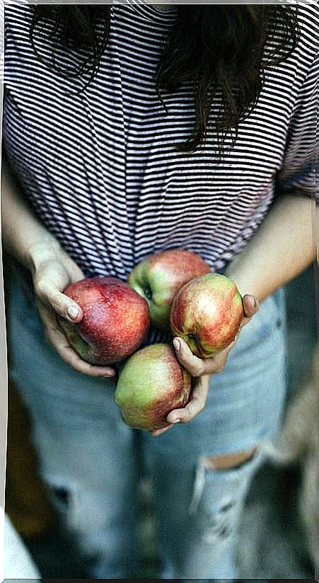 Girl with apples